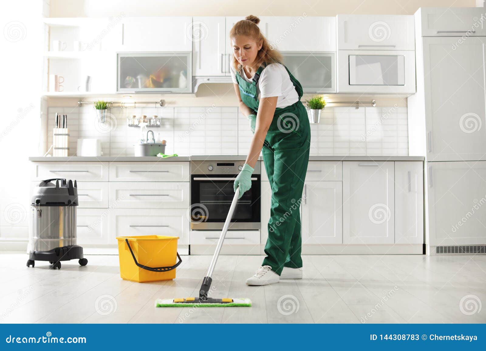 Professional Janitor Cleaning Floor with Mop Stock Image Image of