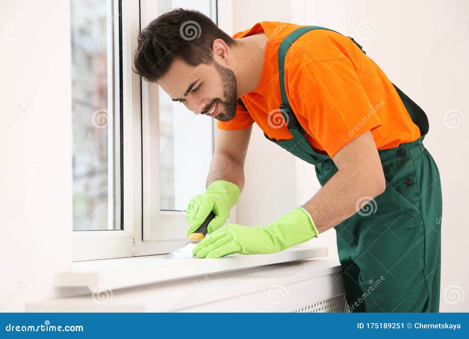 Professional Janitor Cleaning Windowsill in Room Stock Image Image of
