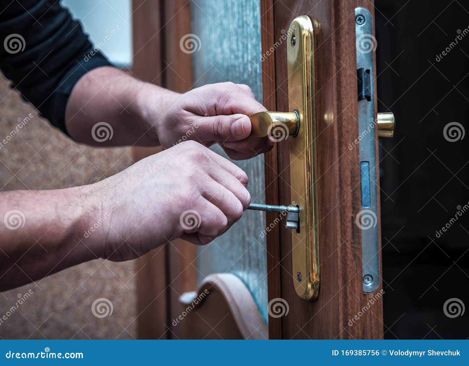 Locksmith repair door lock stock photo. Image of handyman 169385756