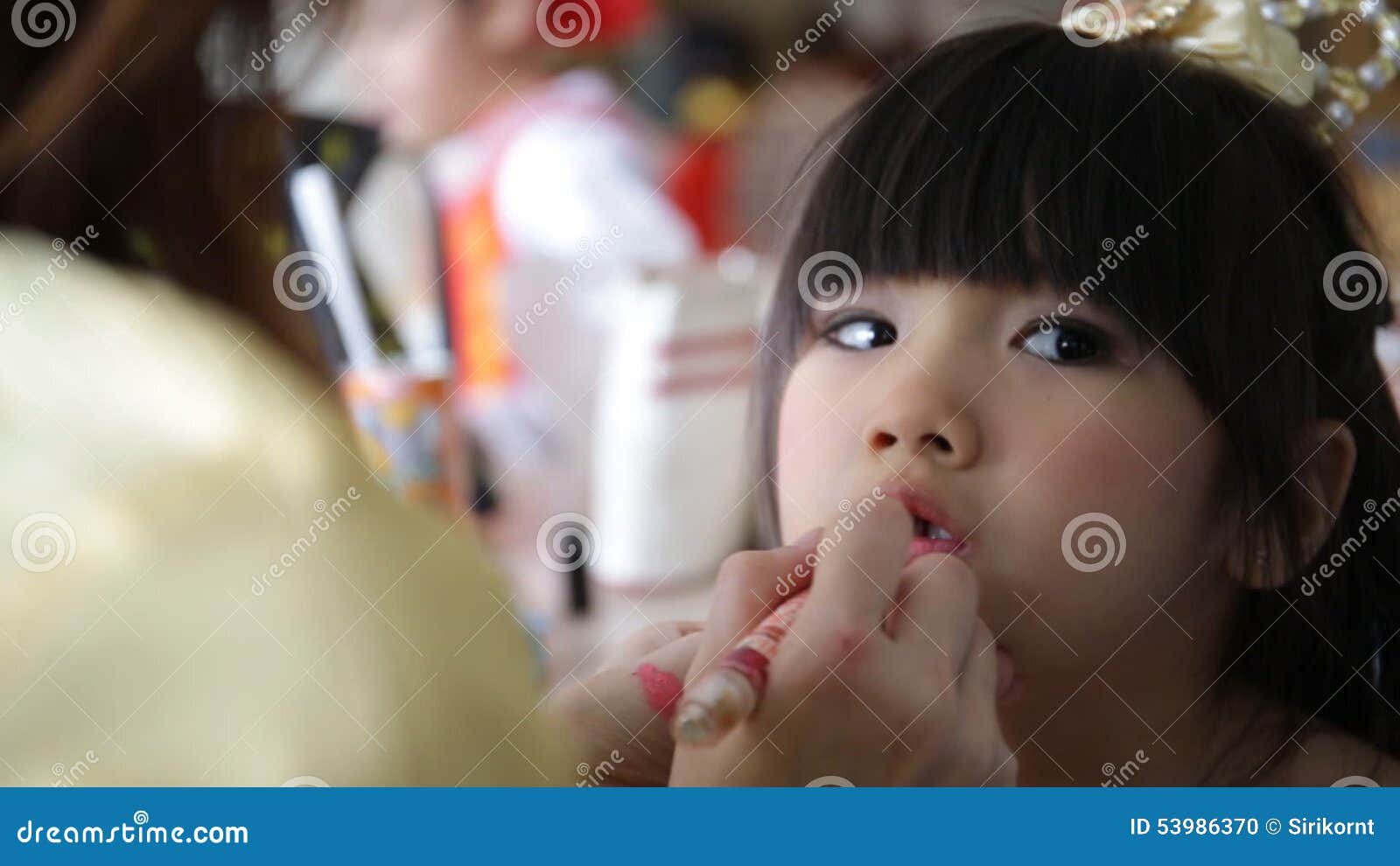 Professional Makeup Artist Working with Cute Asian Child Stock Footage