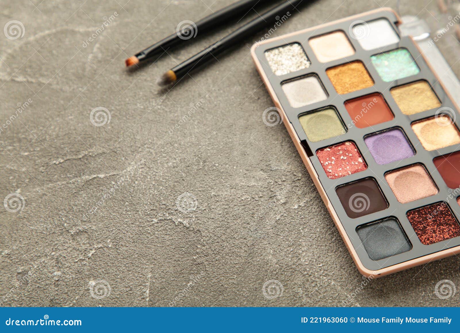 Professional Makeup Palette with Brushes on Grey Background Stock Photo
