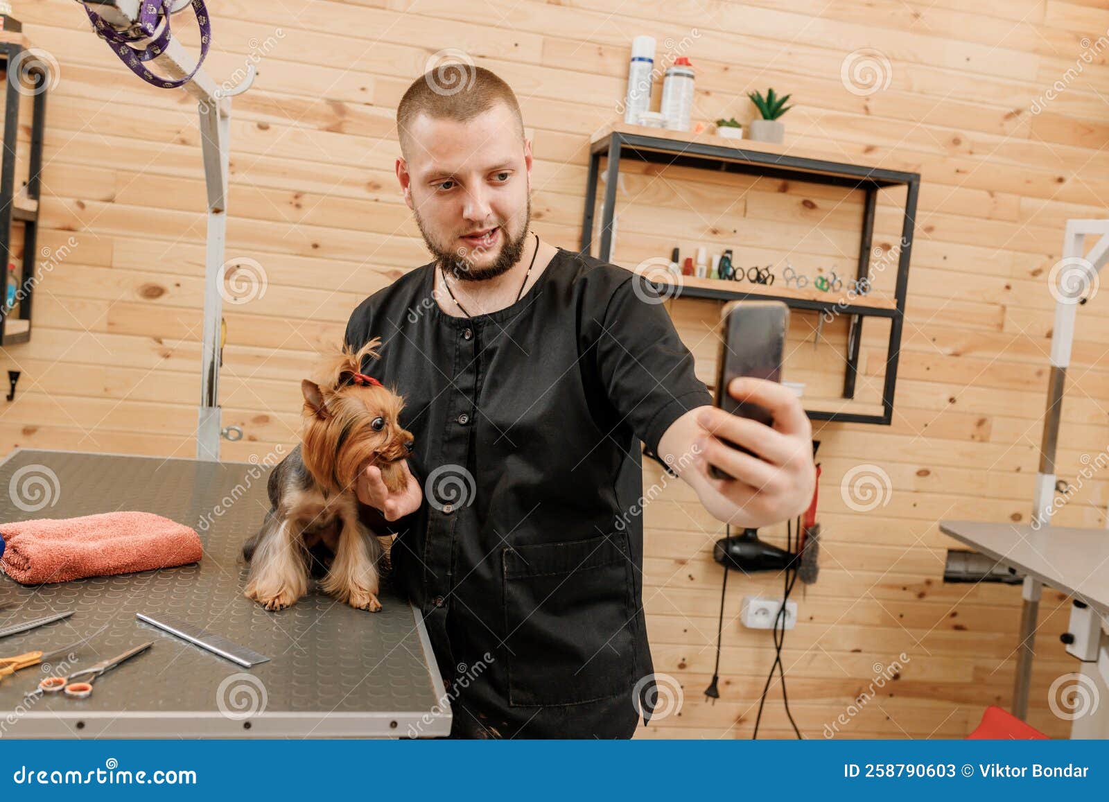 Professional Male Groomer Making Photo with Dog Client after Grooming ...