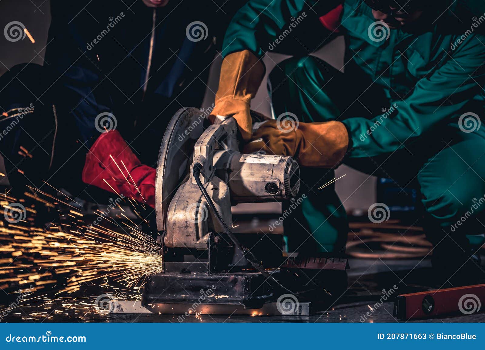 Professional Mechanic Man is Cutting Steel Metal with Rotating Carbon