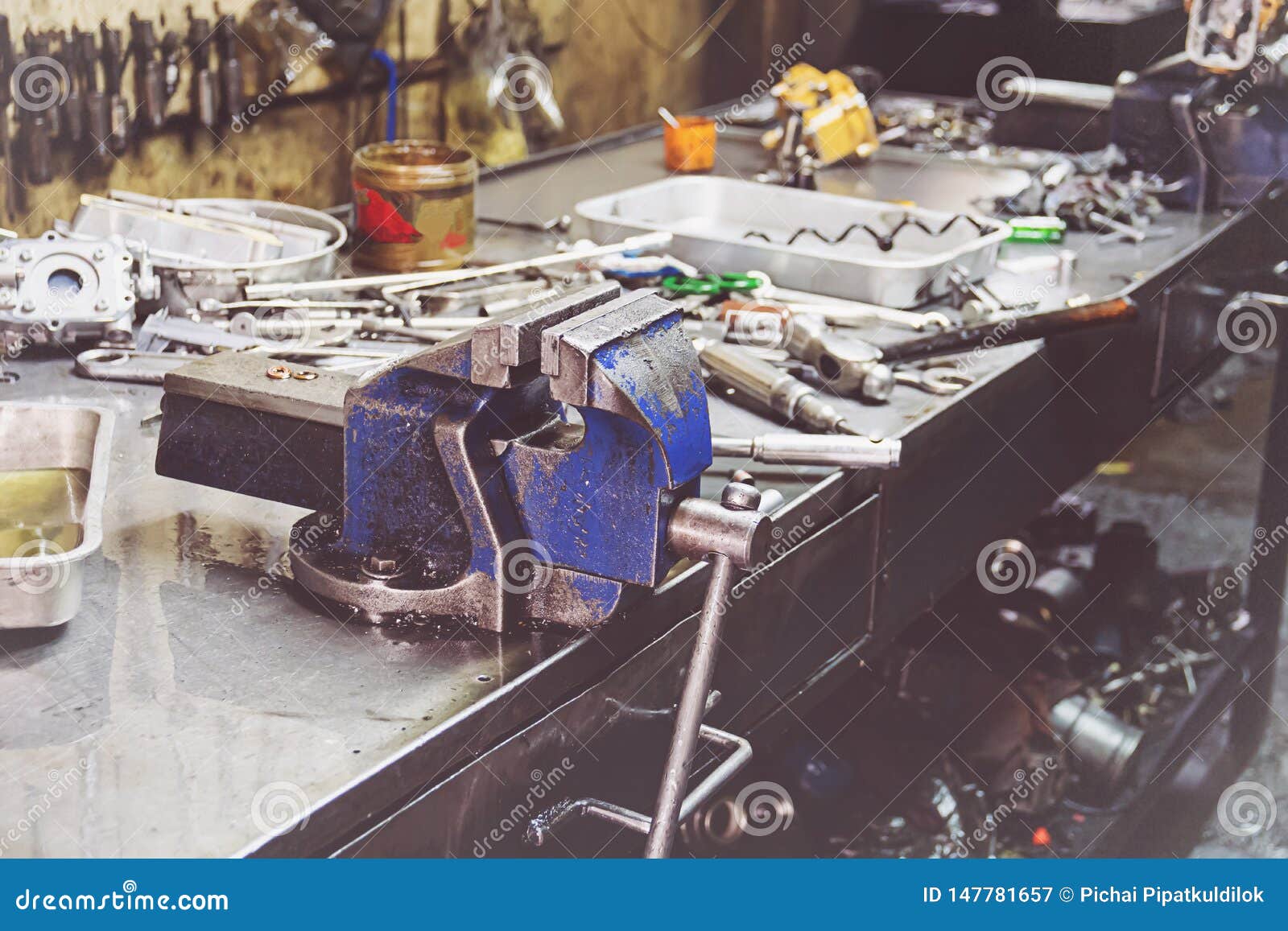 Professional Mechanic Using Different Tools for Working in Auto Repair Service Stock Image