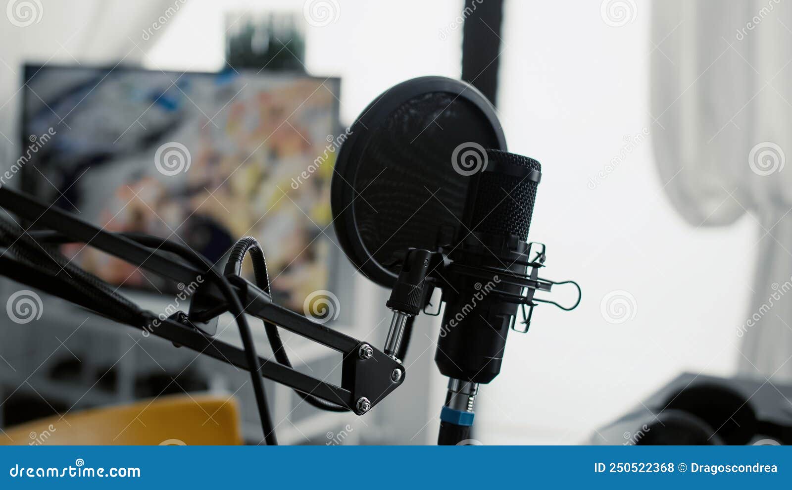 Professional Microphone on Stand Installed in Home Studio Stock Photo