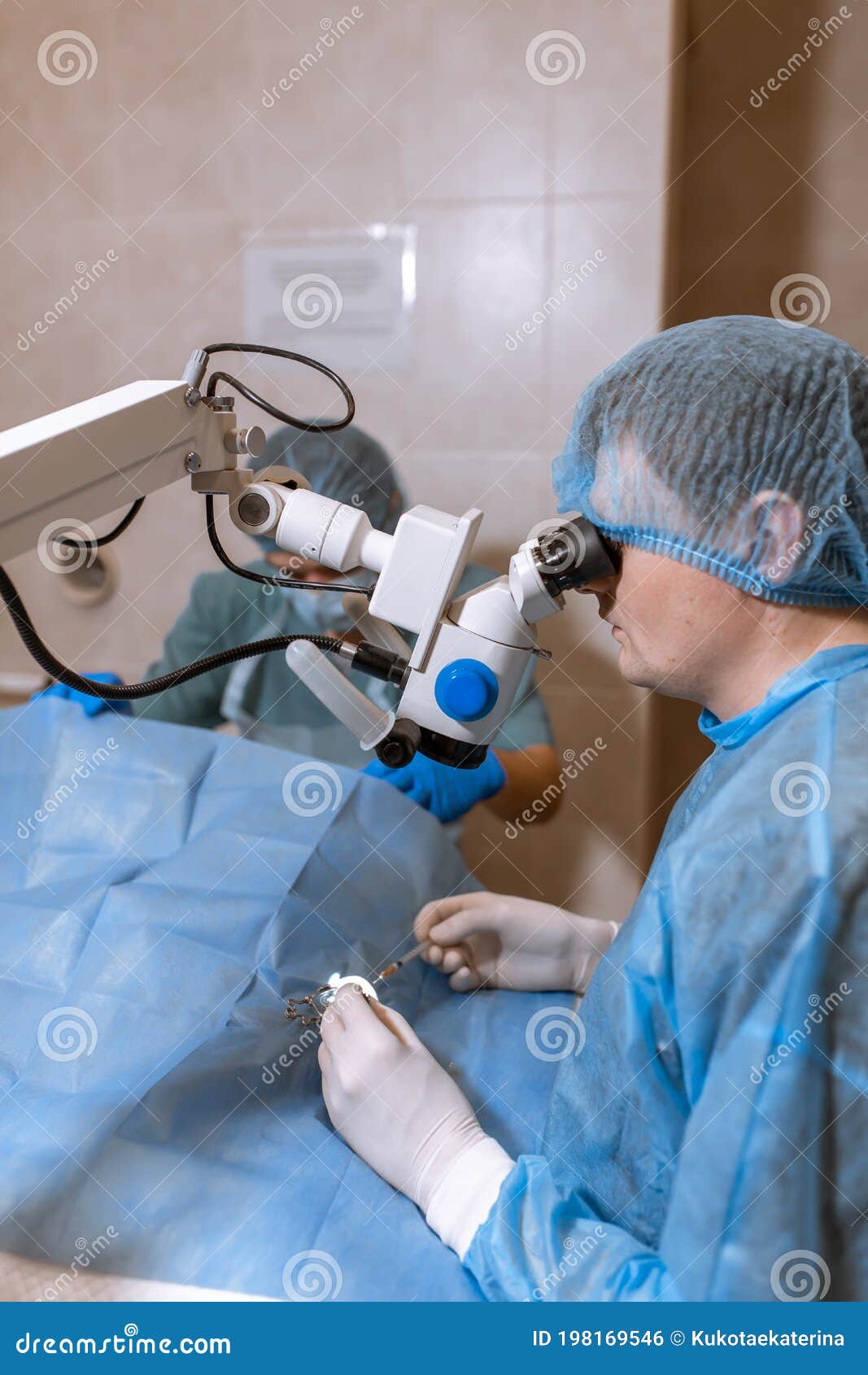 A Professional Ophthalmologist Performs Eye Surgery With A Microscope
