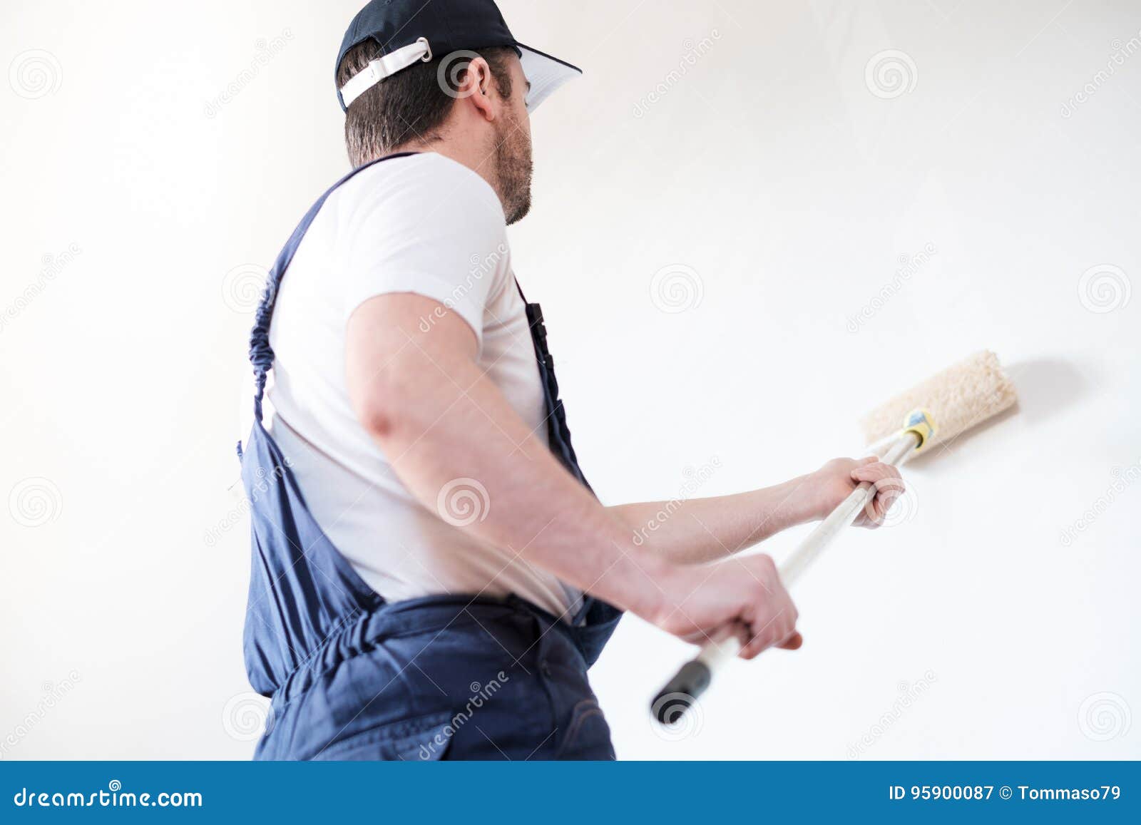 Professional Painter Worker is Painting One Wall Stock Image Image of