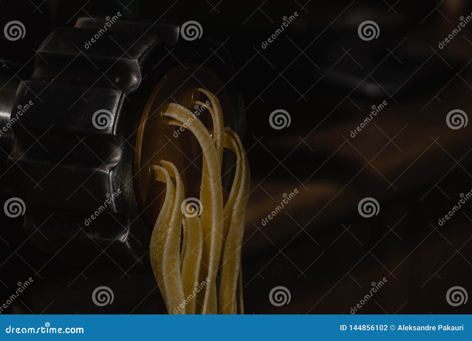 Professional Pasta Maker Machine in Working Procces in Restaurant