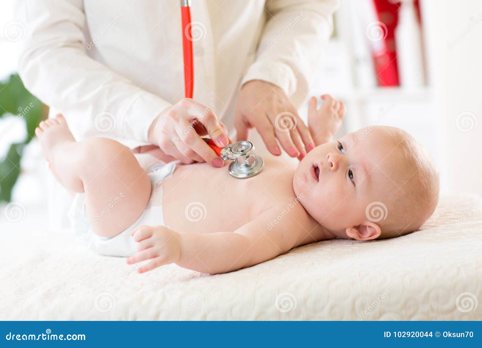 Professional Pediatrician Examining Infant Baby Stock Photo Image of
