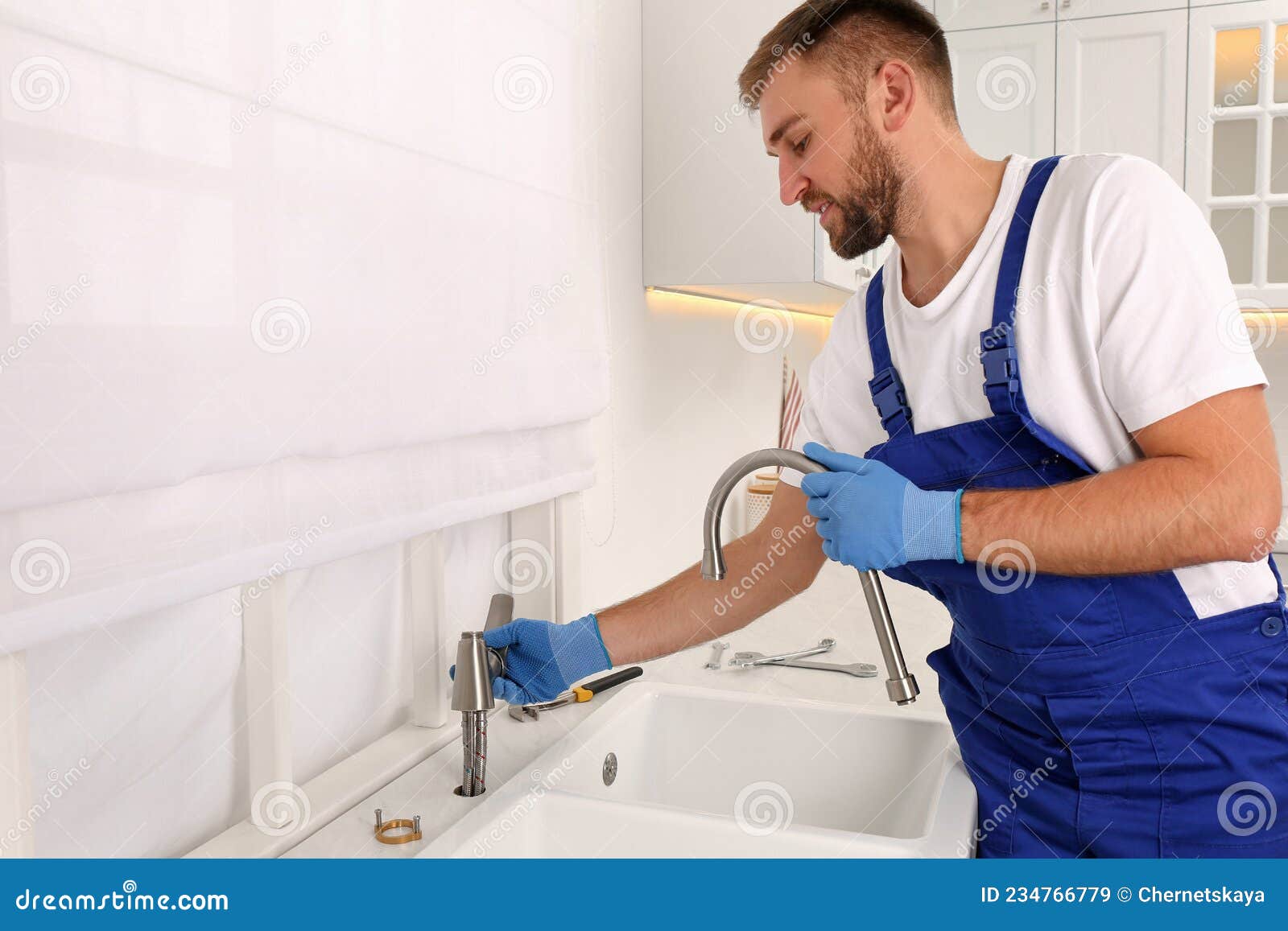 Professional Plumber Repairing Water Tap in Kitchen Stock Image Image