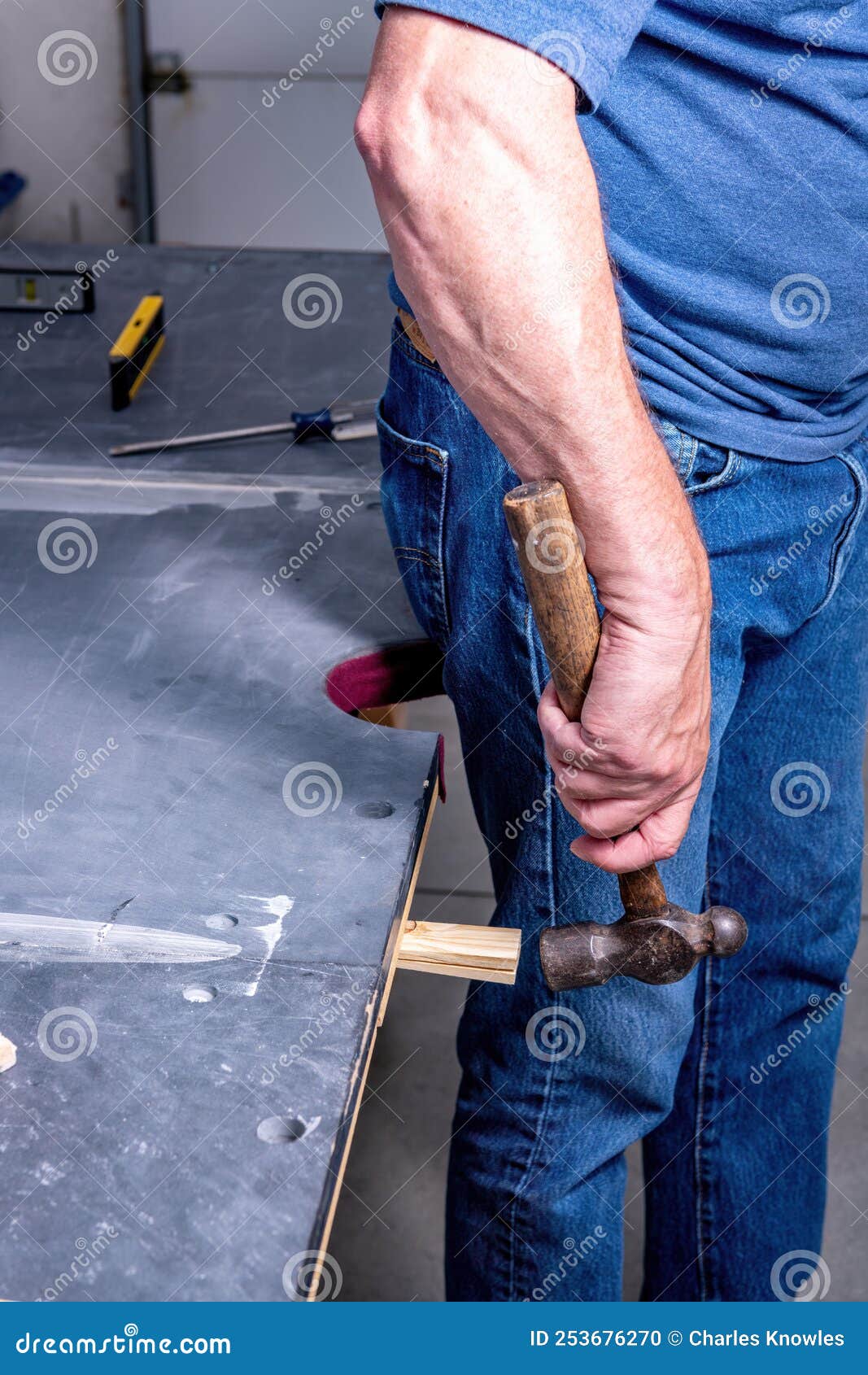 professional pool table installation inserts shims under slate