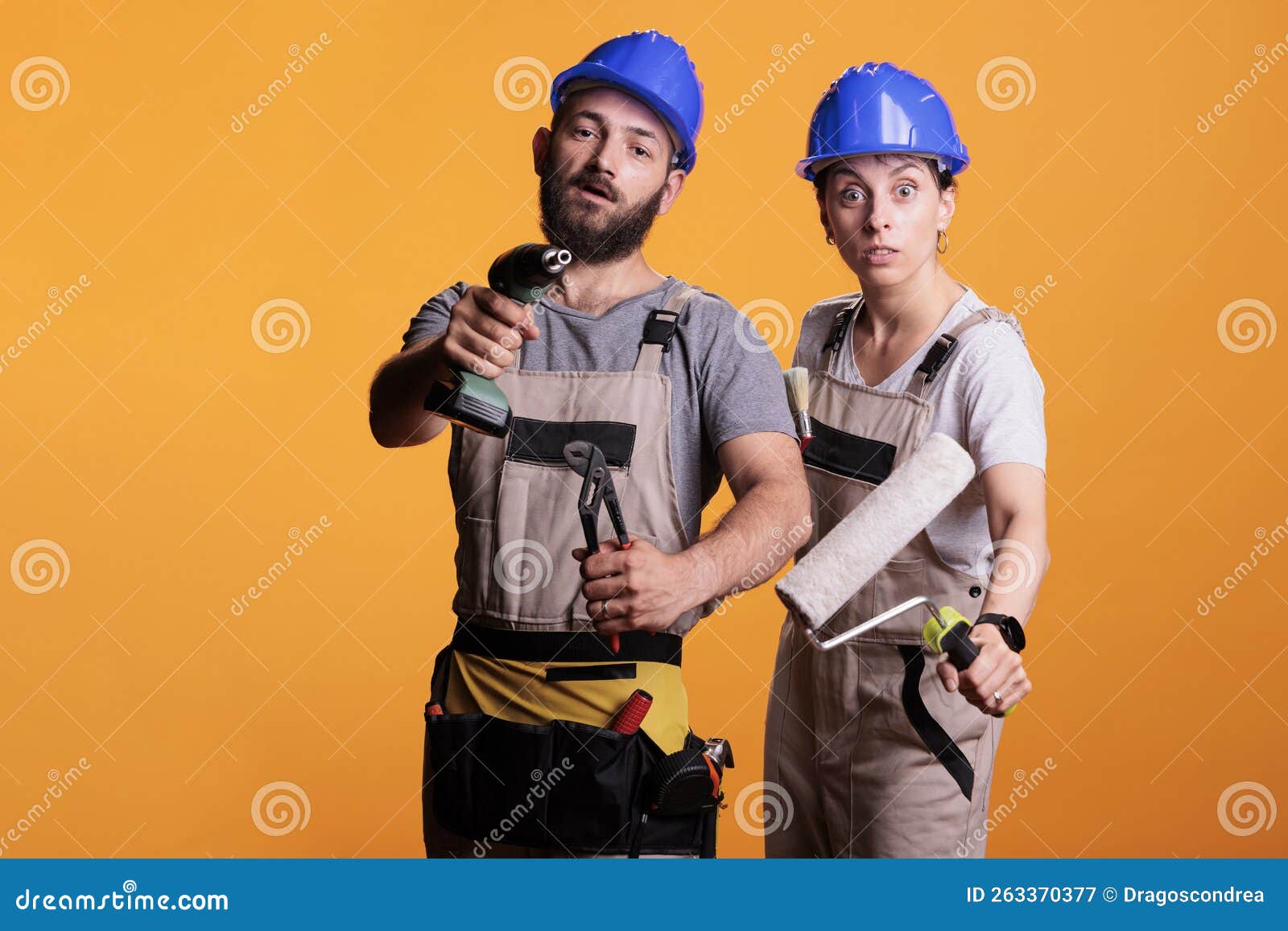Professional Renovators Showing Construction Tools Stock Image Image Of Repairman Woman
