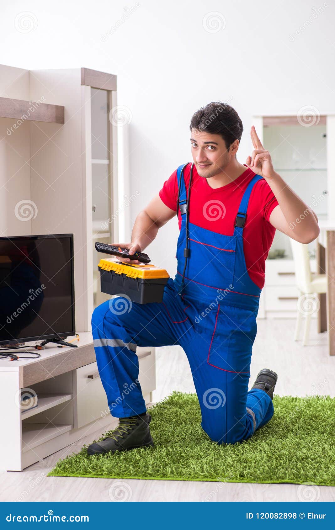 The Professional Repair Engineer Repairing Broken Tv Stock Photo