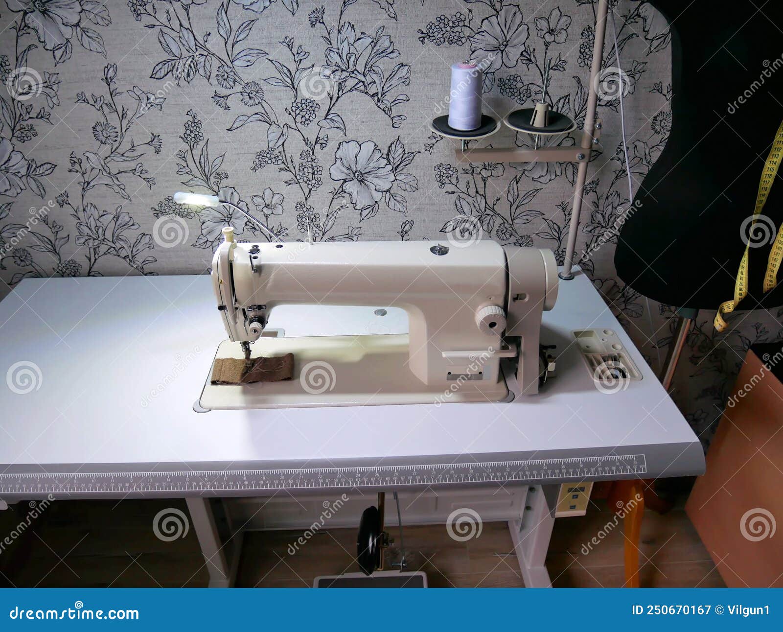 Professional Sewing Machine at Home. Sewing Machine for Work Stock