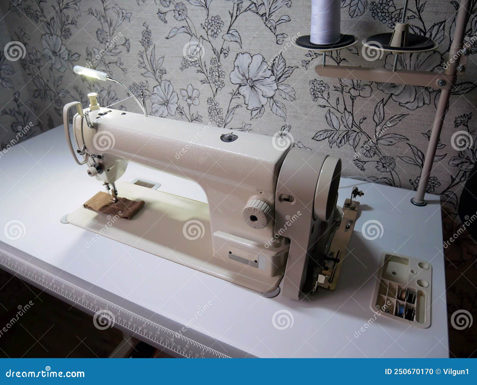 Professional Sewing Machine at Home. Sewing Machine for Work Stock