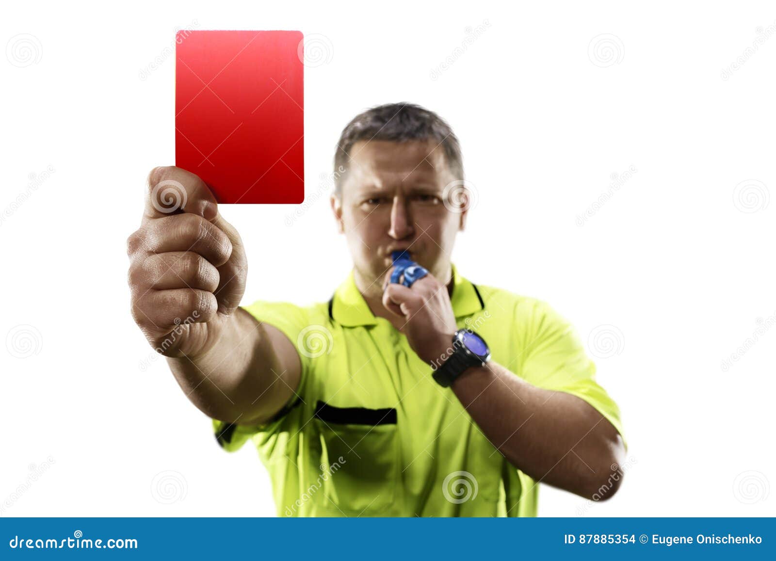 professional soccer referee giving the red card 