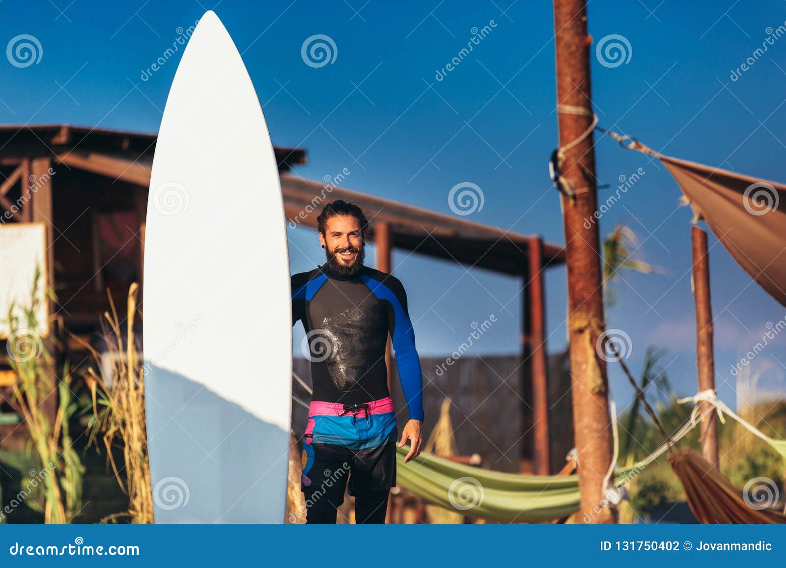 Professional Surfer Holding a Surf Board Stock Photo - Image of modern ...