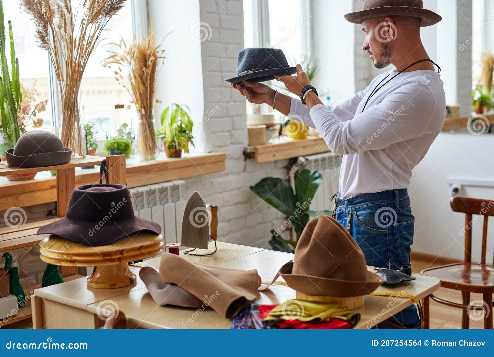 Professional Tailor Man Looking at His Handmade Hat Stock Photo Image of leisure, occupation