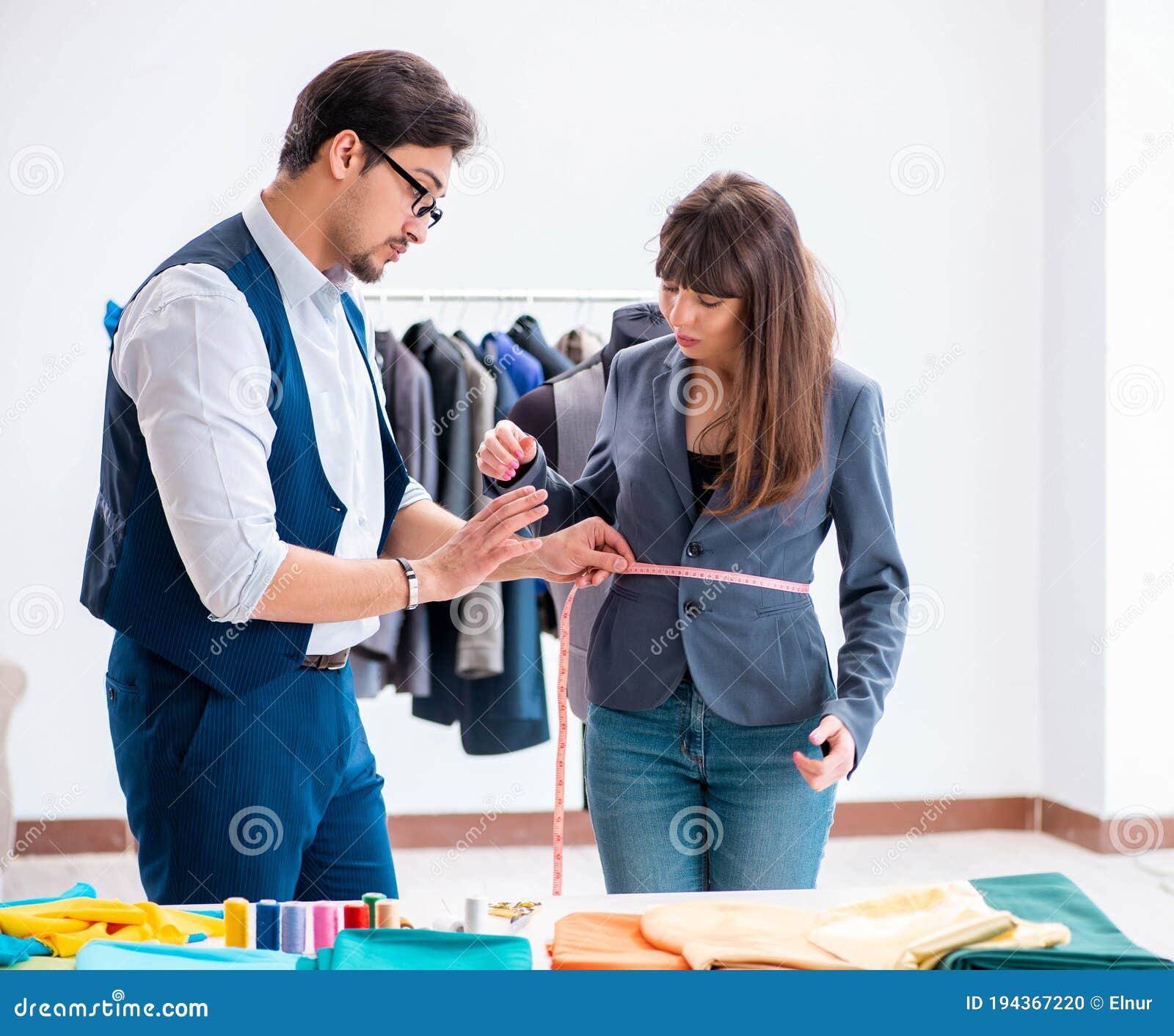 Professional Tailor Taking Measurements for Formal Suit Stock Photo ...