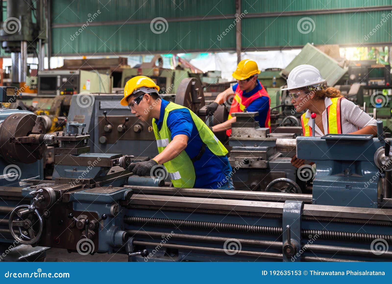 Professional Technicians are Working with Machines in Industrial Plants