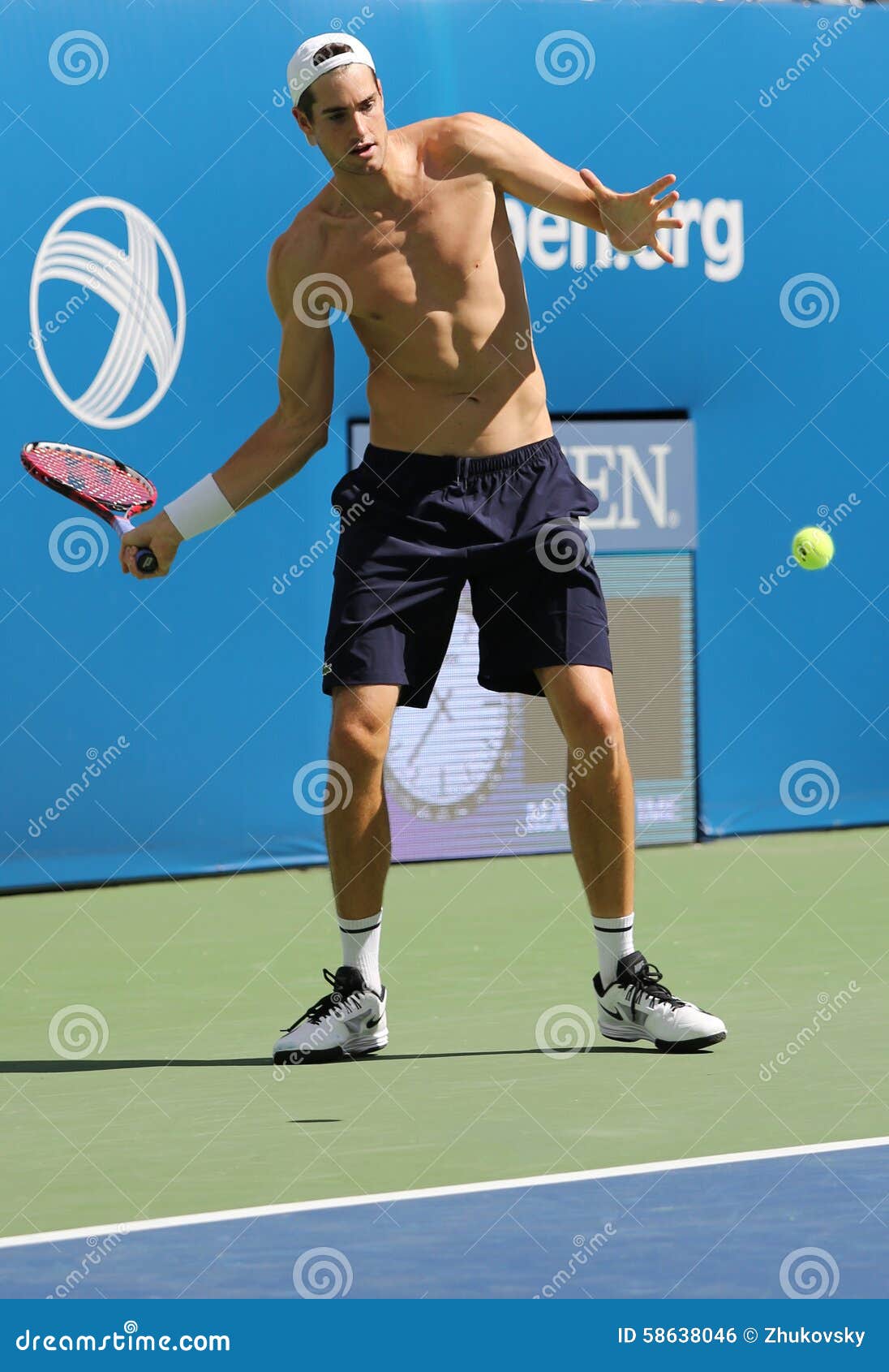 Professional Tennis Player John Isner of United States Practices for US  Open 2015 Editorial Photo - Image of singles, backhand: 58638046