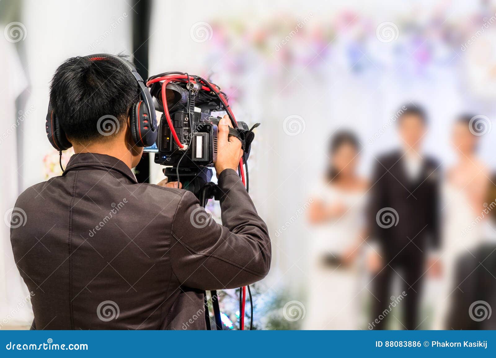 Professional Videographer Recording Wedding Ceremony Day Editorial