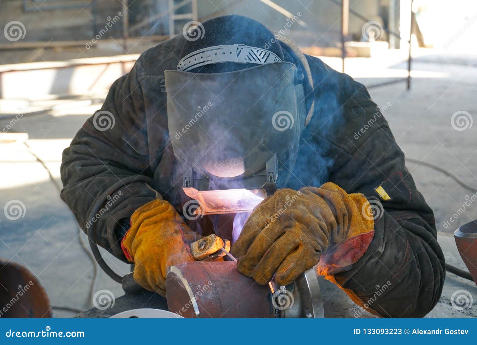 Professional Welder Works with Manualarc Welding. Stock Image Image