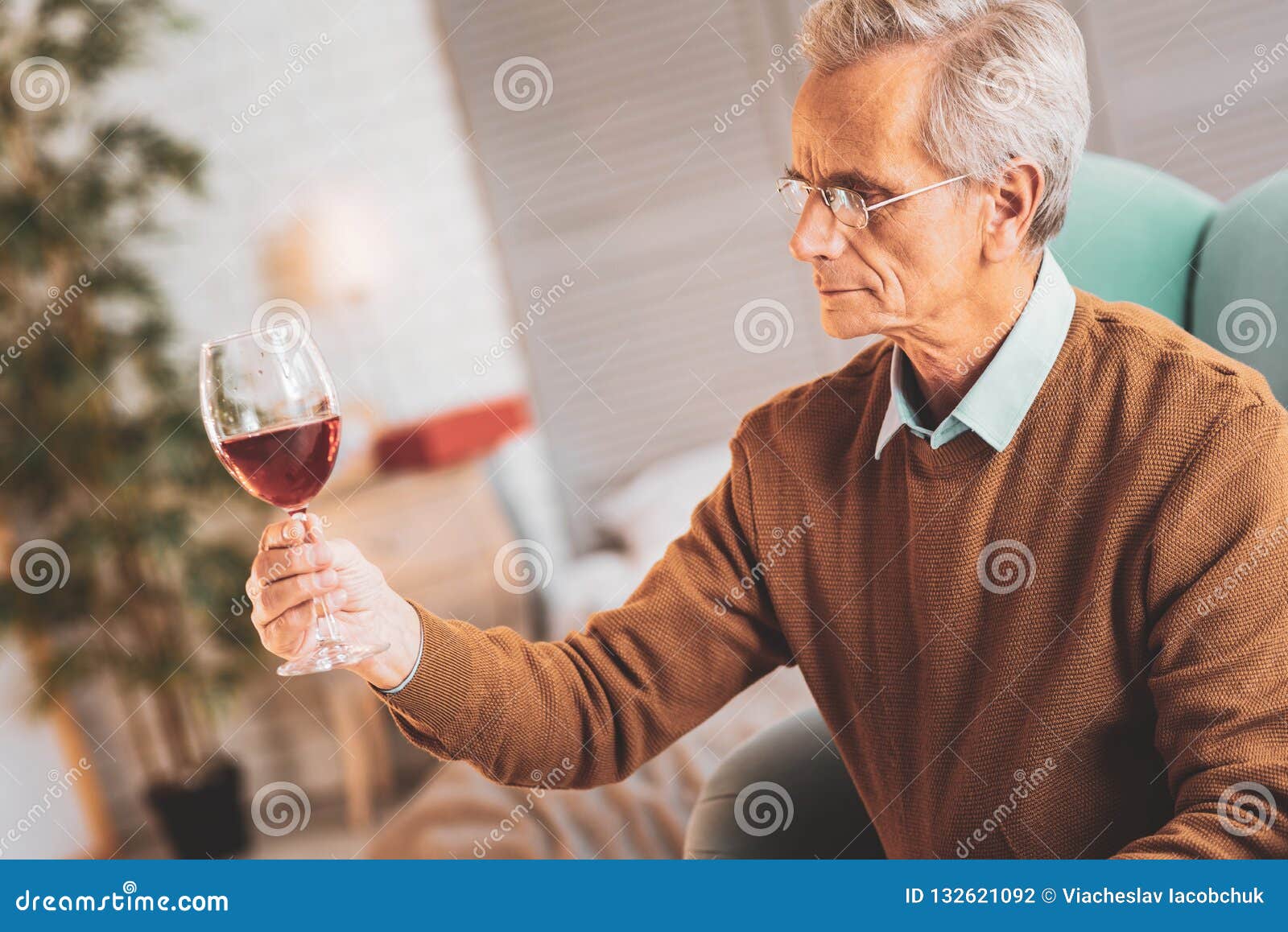 Professional Wine Expert Looking at Glass of Red Wine Stock Photo Image of retirement, home