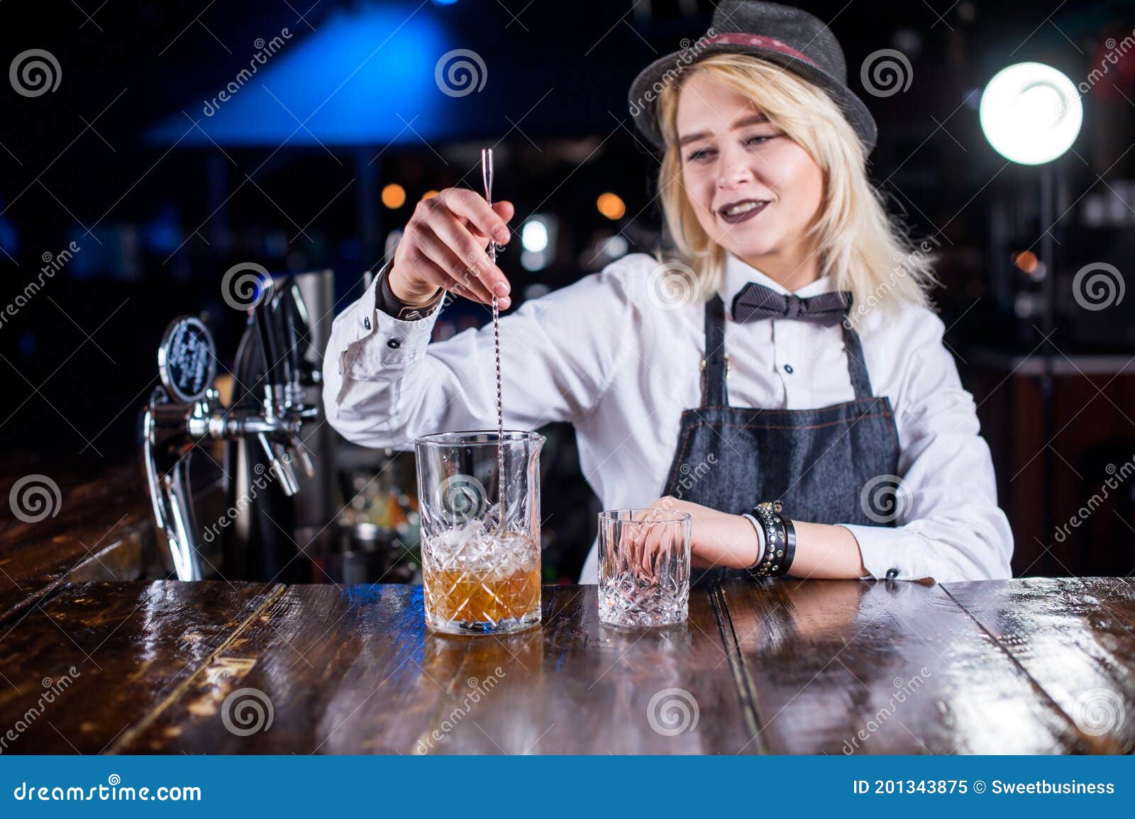 Professional Woman Bartender is Pouring a Drink Stock Image - Image of ...