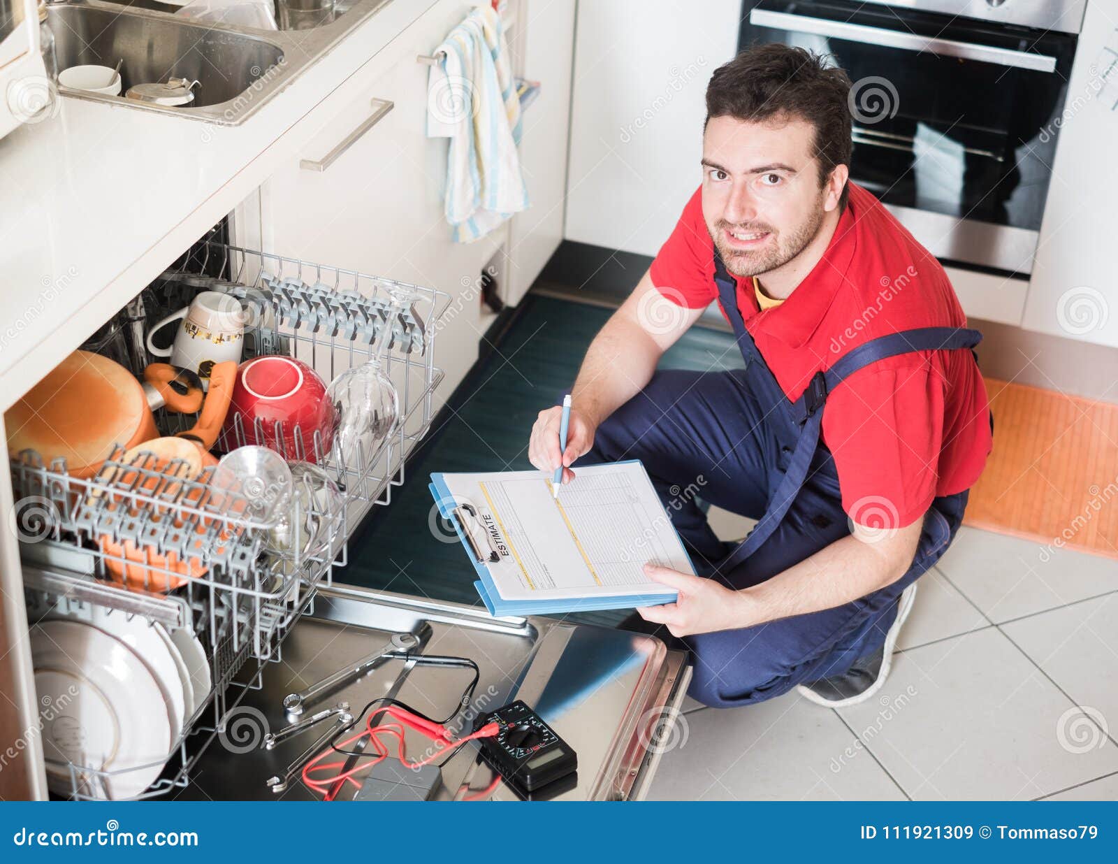 Worker Estimating Cost for Broken Dishwasher Stock Image Image of