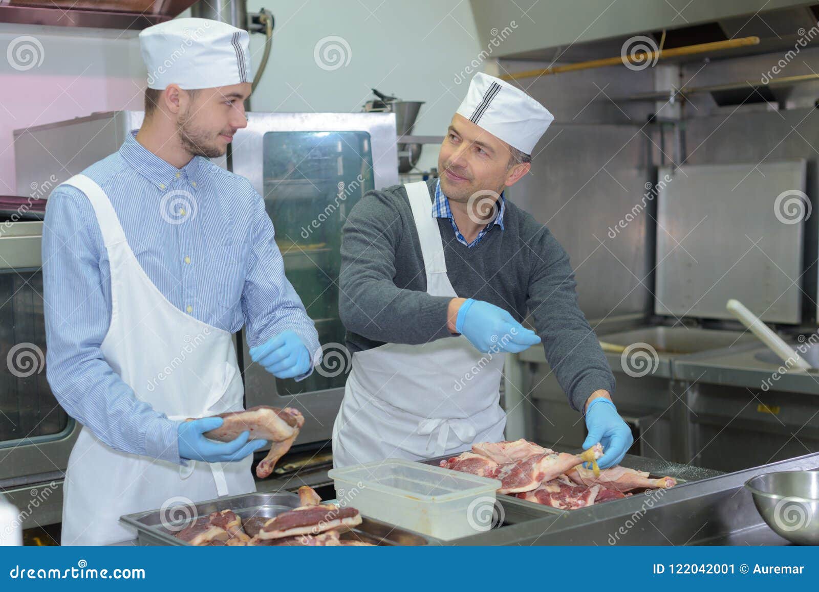 Professional Workers Seasoning Meat Stock Image Image of cook