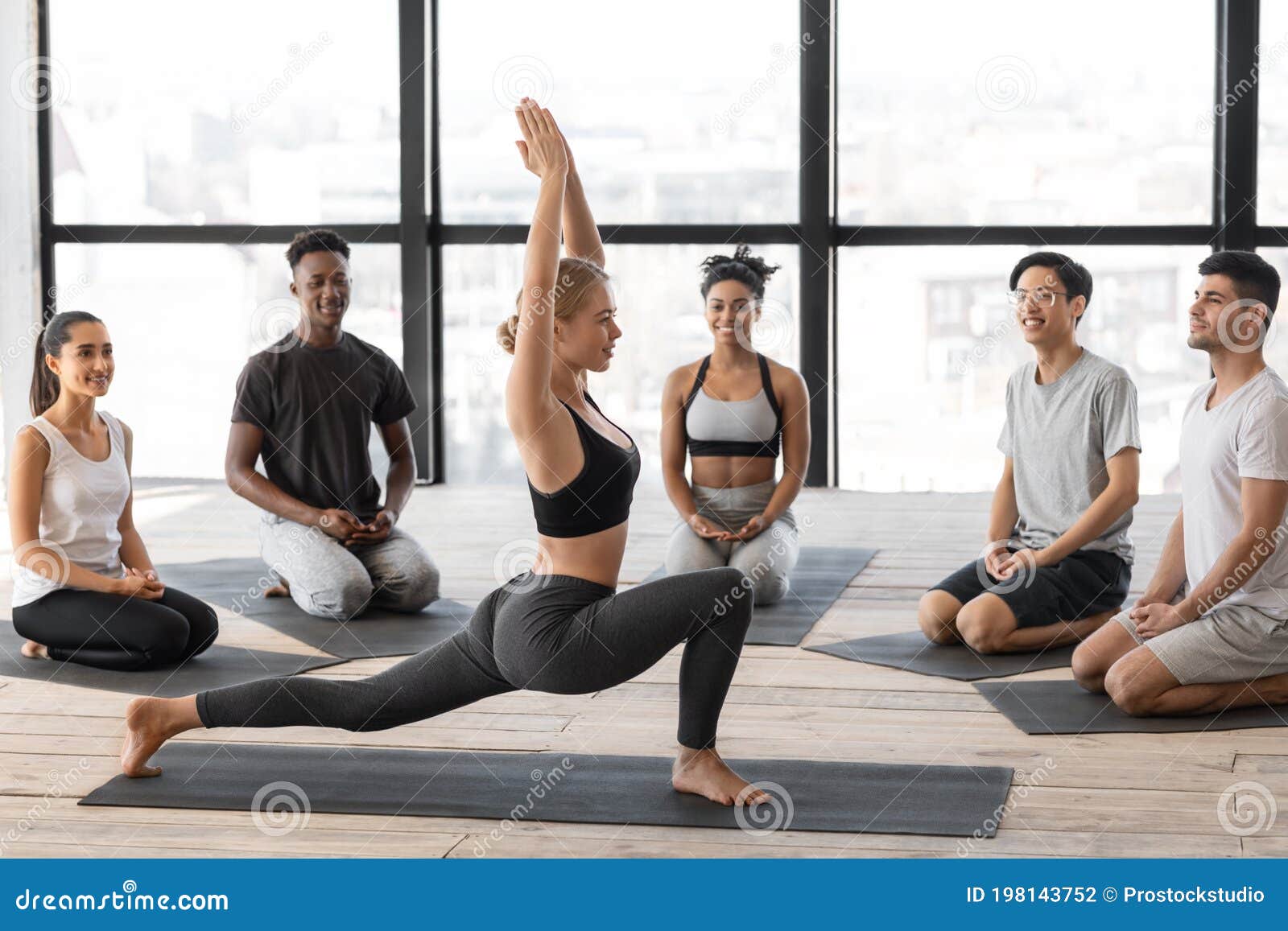 https://thumbs.dreamstime.com/z/professional-yoga-instructor-woman-showing-different-asanasto-group-lesson-members-studio-professional-yoga-instructor-woman-198143752.jpg