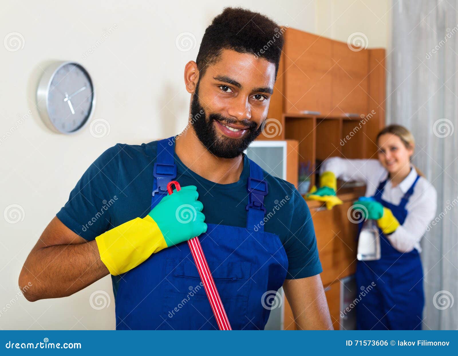Professional Young Cleaners Cleaning and Dusting Stock Photo Image of