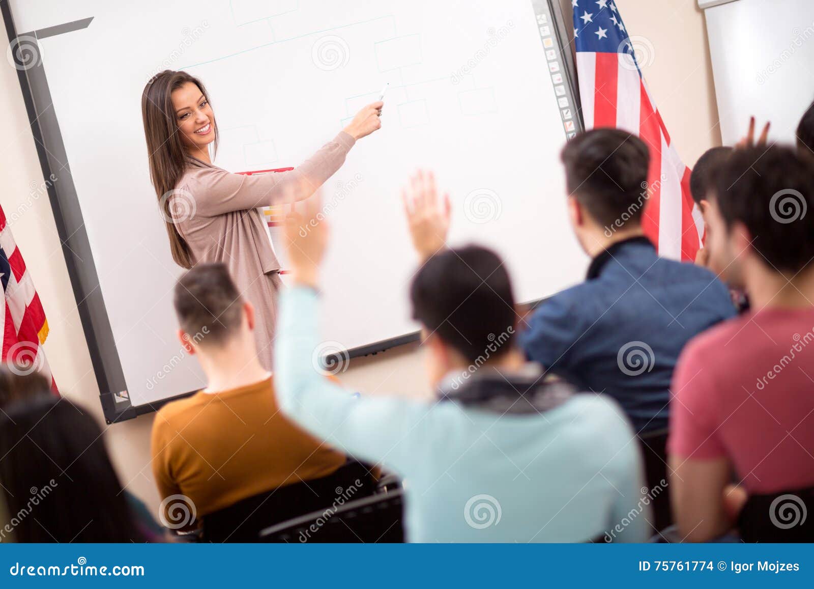 professor explain to students in the classroom