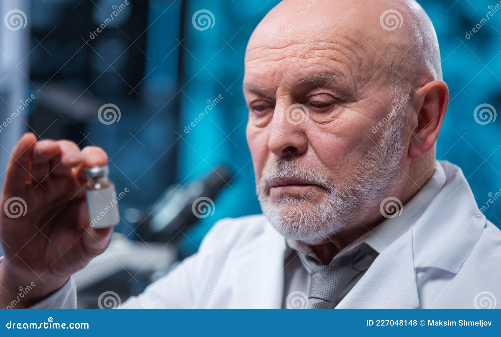 Professor Works in a Modern Scientific Laboratory Using Equipment and
