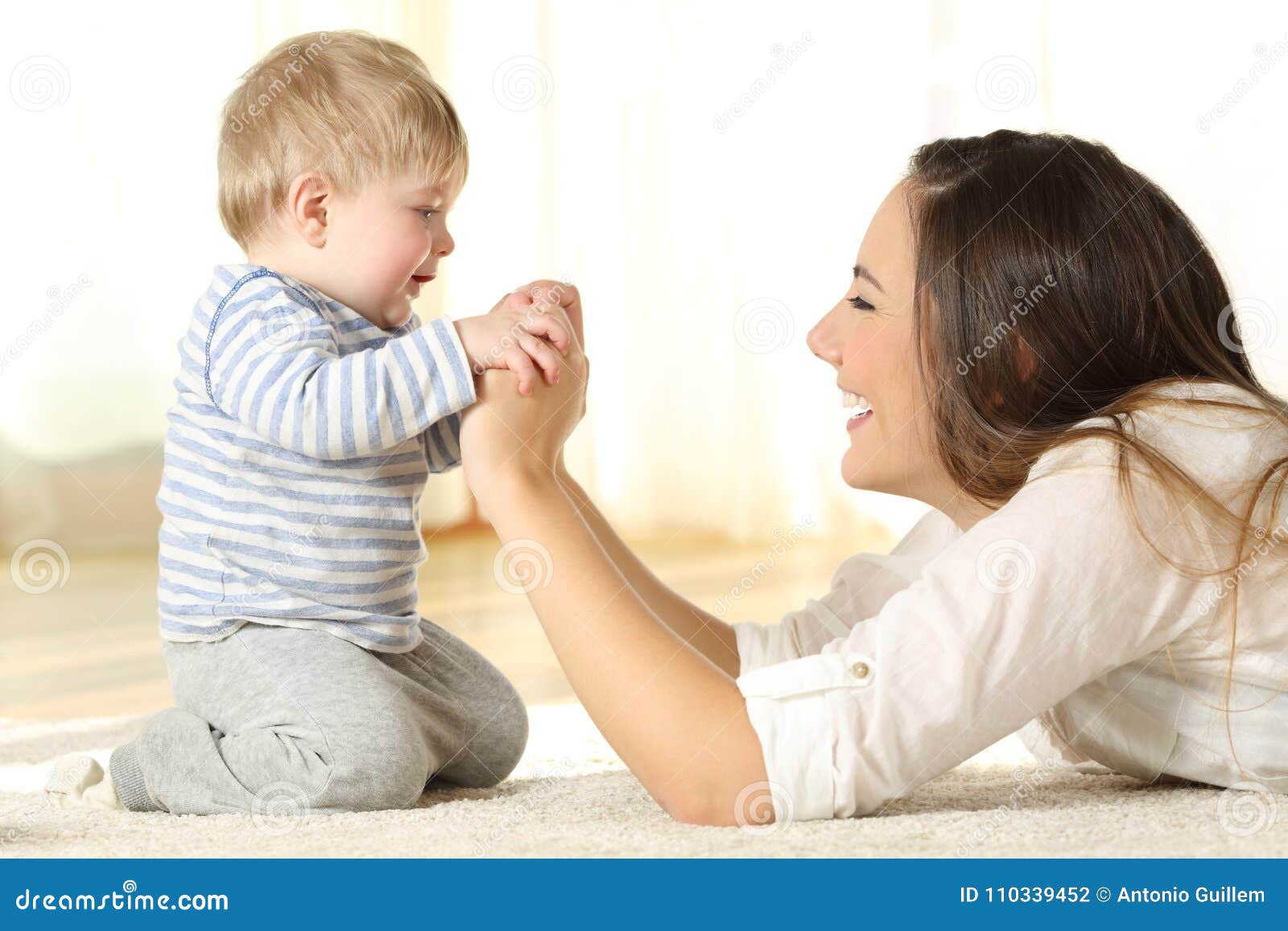 Profile of a Mother and Her Kid Son Holding Hands Stock Photo ...