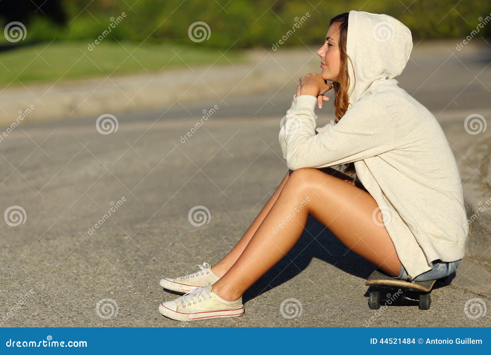 Profile Of A Pensive Sitting On A Skate In Profile Of A Pensive Sitting On A Skate In