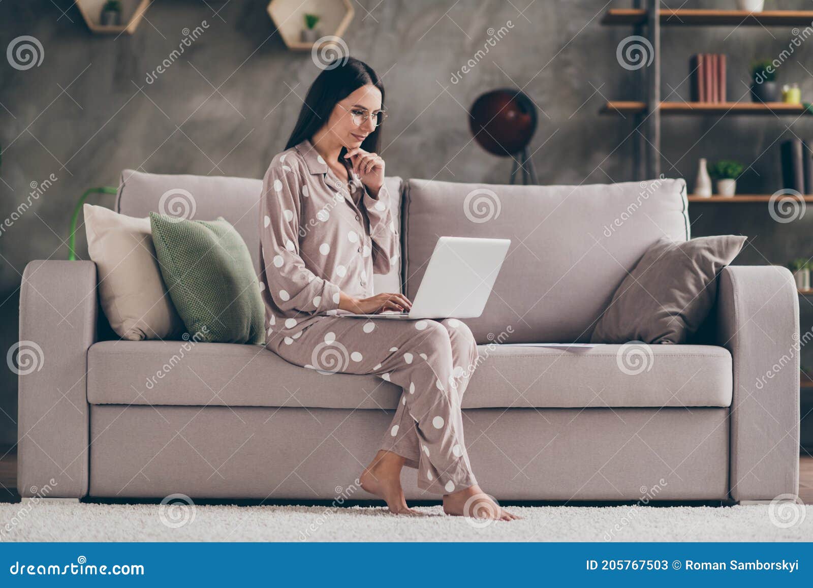 profile photo of nice optimistic girl fist face sit write laptop wear spectacles pijama at home on sofa