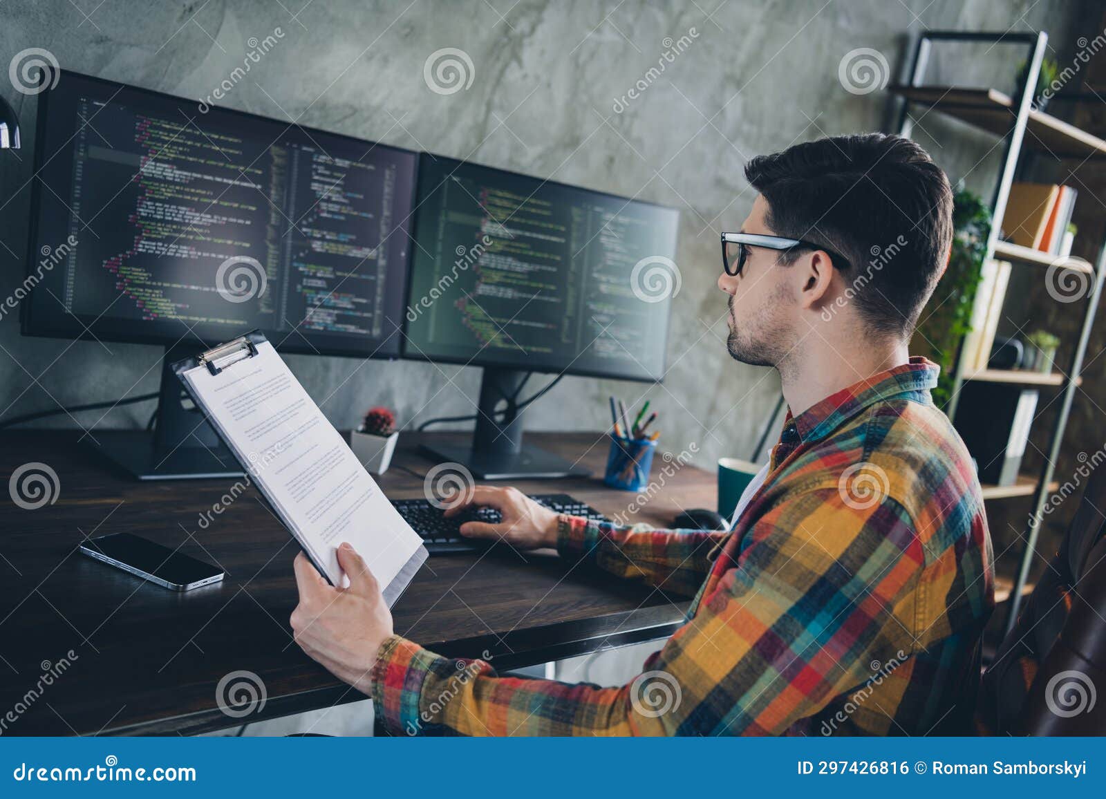 Profile Portrait of Experienced Java Script Coder Hold Clipboard Documents Keyboard Typing Pc