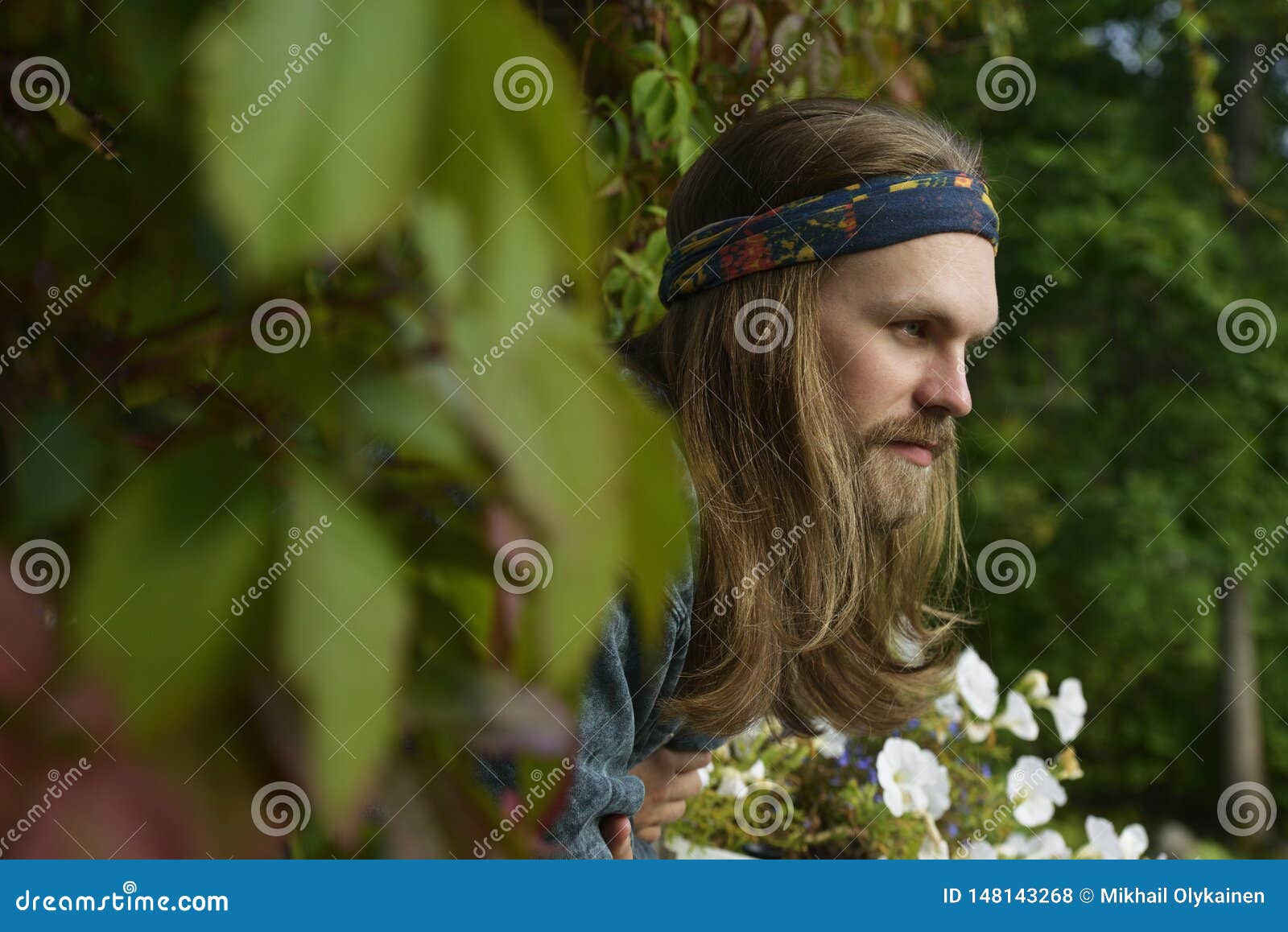 Profile Portrait a Young Man with Long Hair and Beard in a Bandana Stock Photo of gentle, bristle: 148143268