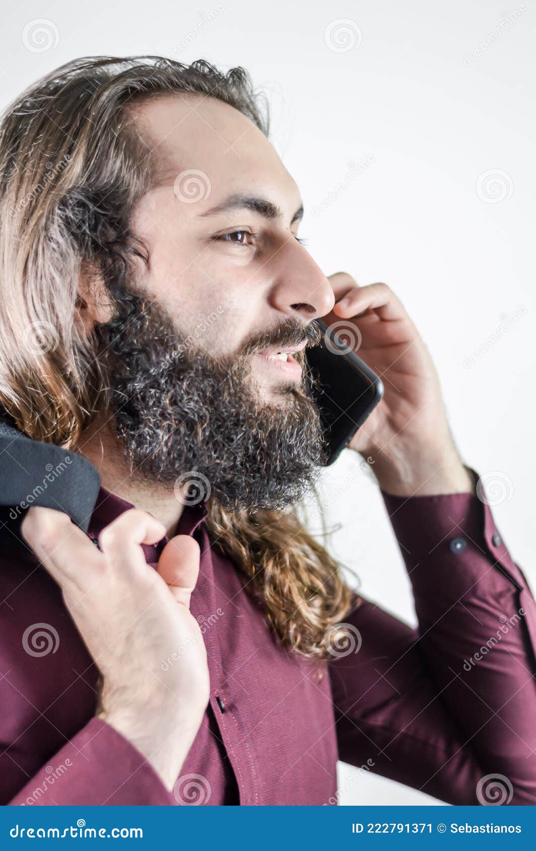 Profile Portrait of a Young Middle Eastern Businessman with Beard and Long Hair while Having a Conversation on the Mobile Phone Stock Image - Image of middle, arabian: 222791371 Profile Portrait of a Young Middle Eastern Businessman with Beard and Long Hair while Having a Conversation on the Mobile Phone Stock Image - Image of middle, arabian: 222791371
