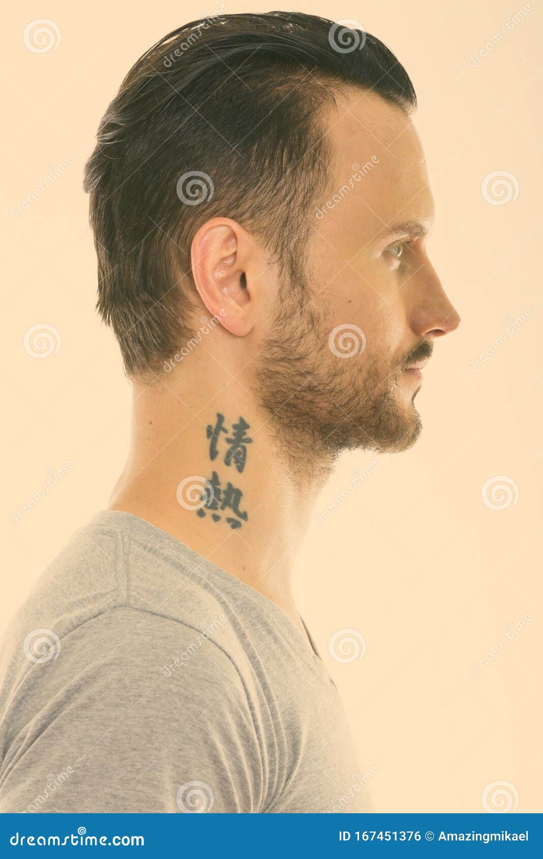 profile of young and tattooed woman isolated on grey Stock Photo  Alamy
