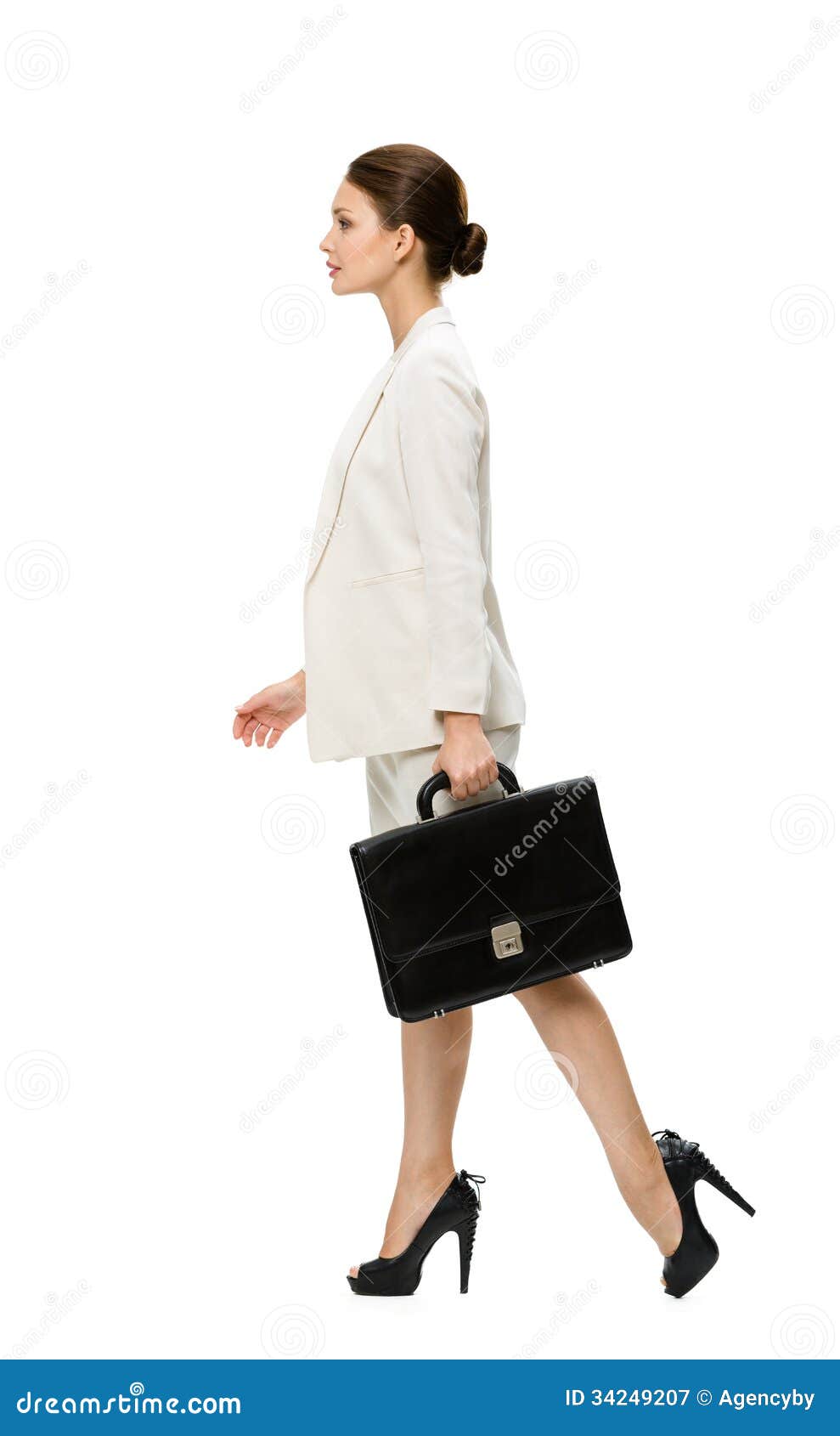 Profile Of Walking Business Woman With Black Case Royalty Free Stock