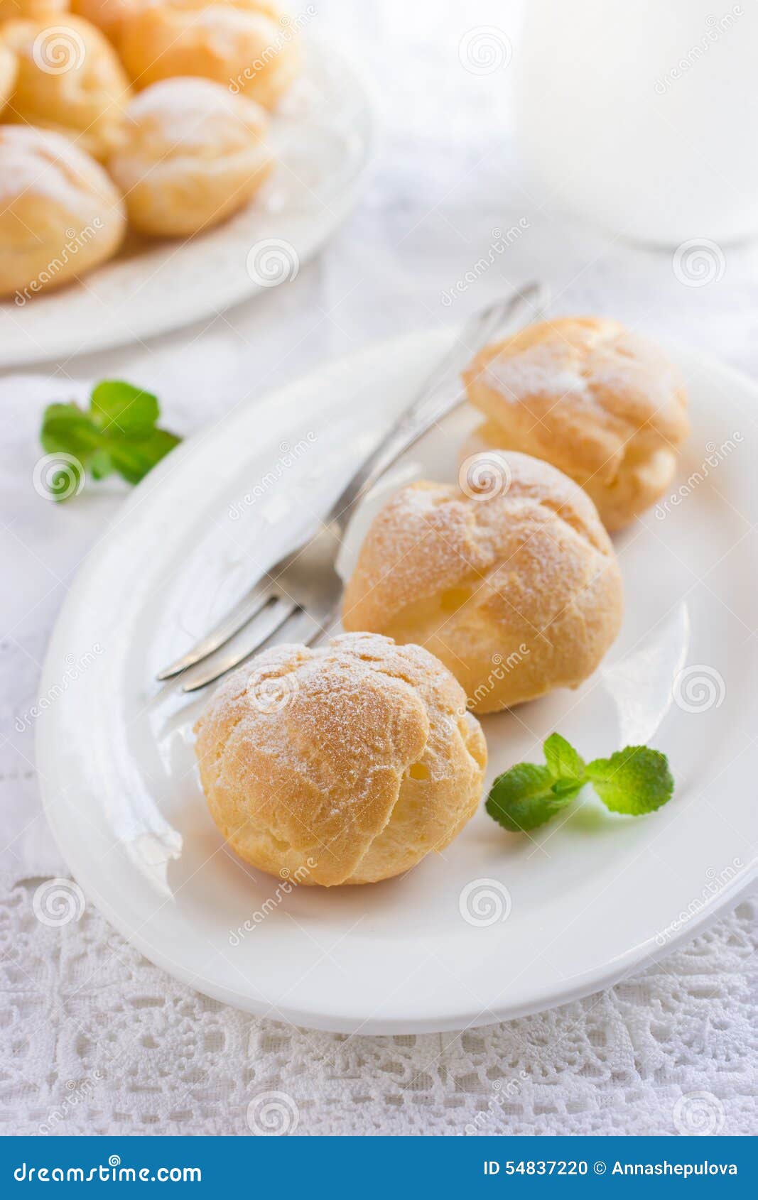 Profiteroles with Cream and Powdered Sugar Stock Photo Image of light
