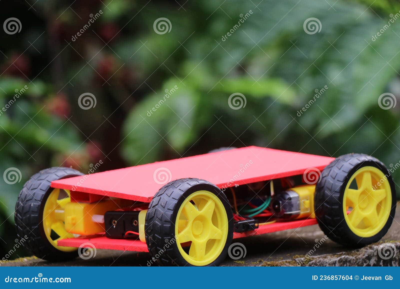 programmable four wheels drive or 4wd robotic car with chasis. hobby electronics project