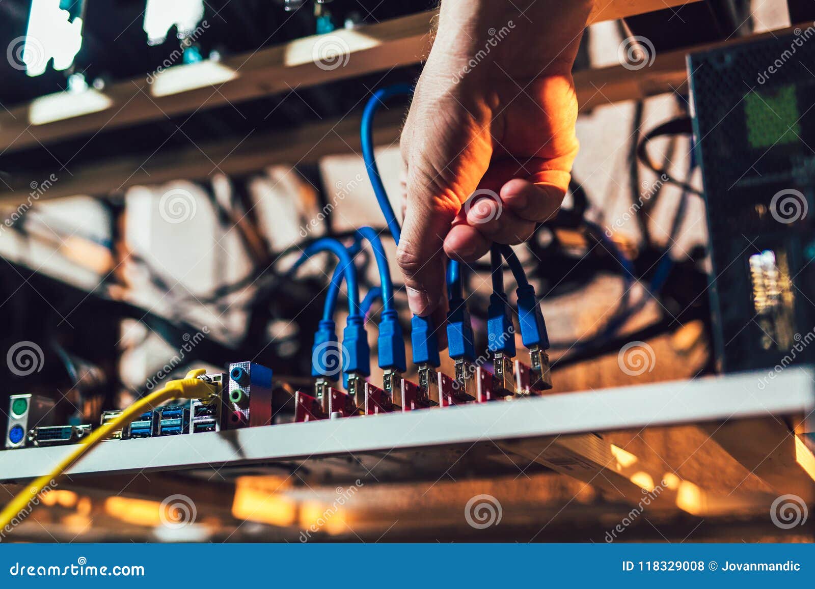 Programmer Configures Hardware for Mining Stock Photo Image of