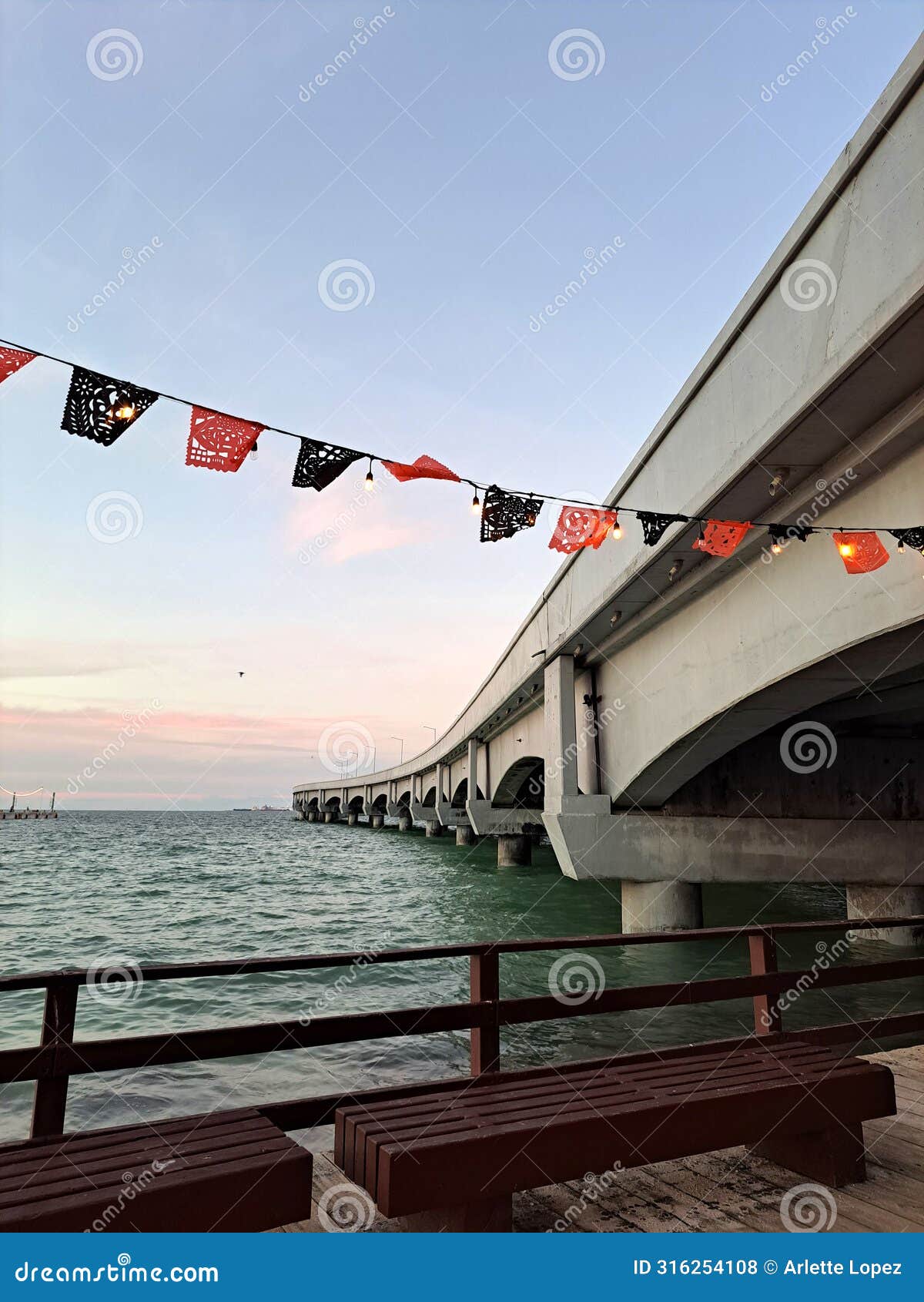 progreso is a mexican port city on the yucatan peninsula with its iconic arched pier and famous boardwalk