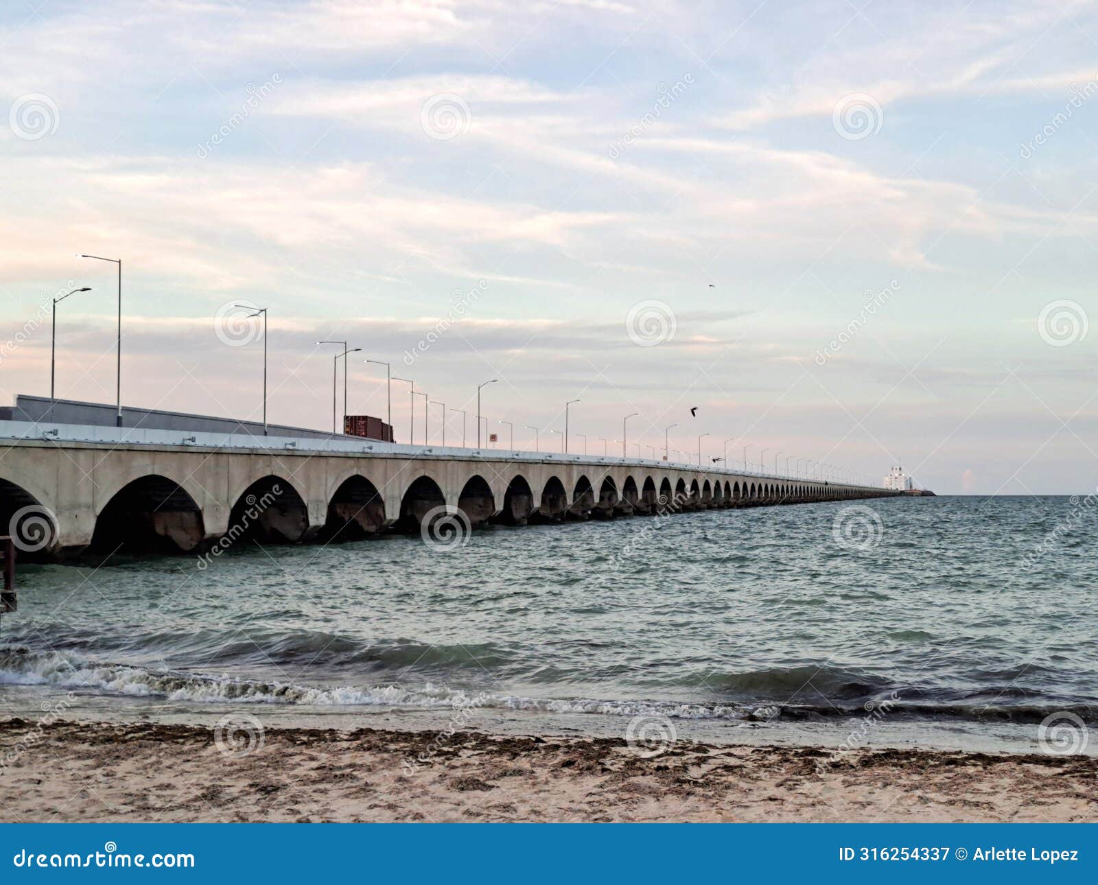progreso is a mexican port city on the yucatan peninsula with its iconic arched pier and famous boardwalk
