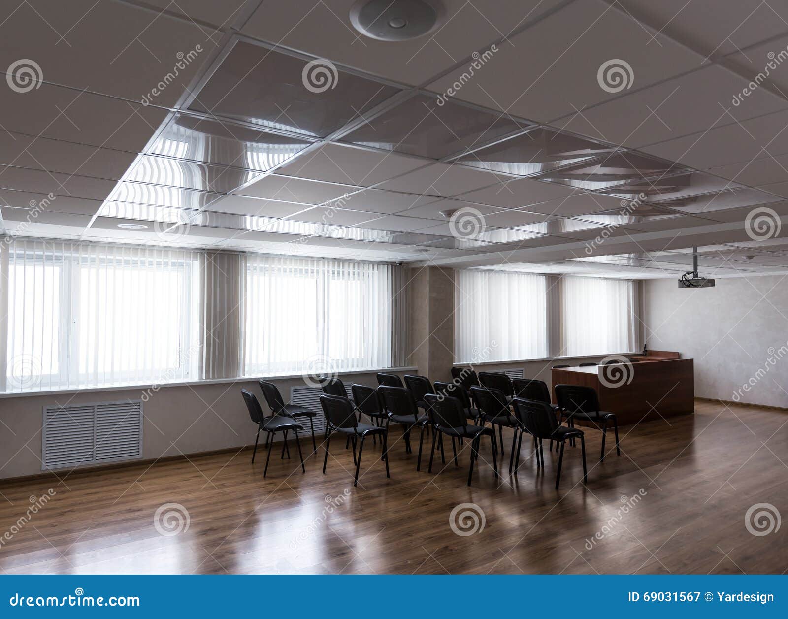 Projector Hang On Ceiling Of Empty Sunlit Meeting Room Stock Image