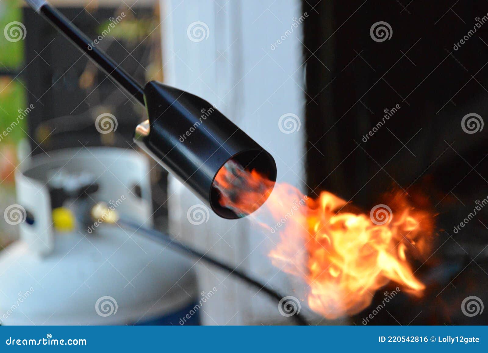 Propane Torch To Shou-sugi-ban Wood Burn a Project Stock Photo